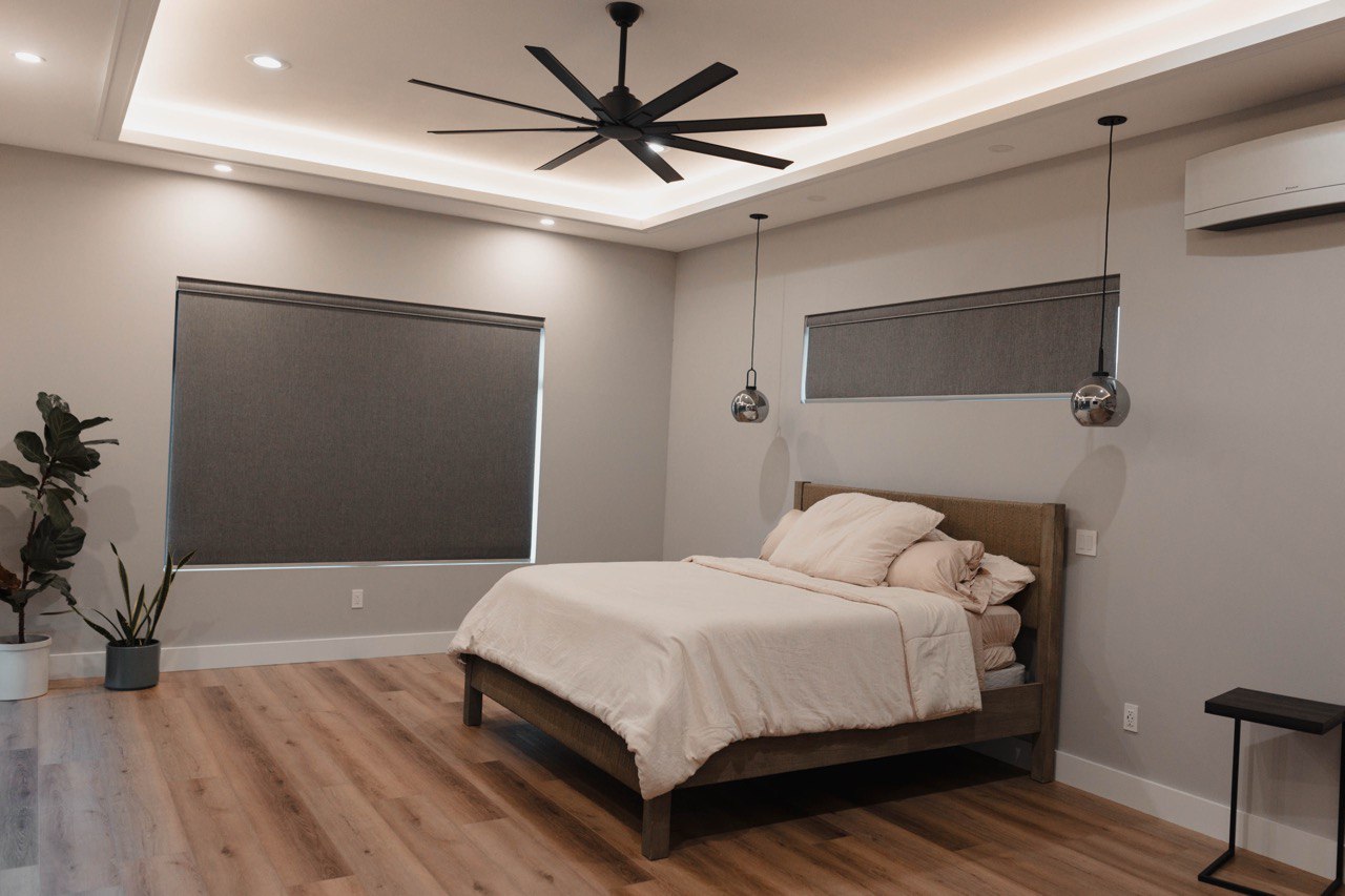 Blackout roller shades in a bedroom