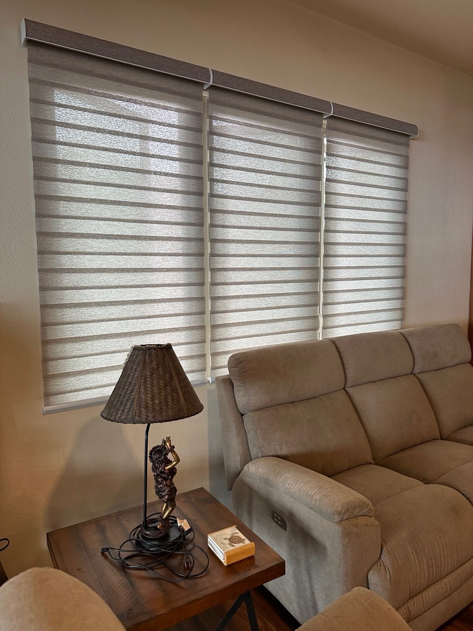 Layered sheer shades in a living room